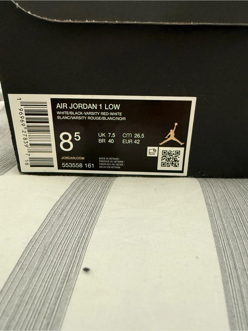 Jordan Men’s Low-Top Sneakers in Black and Red